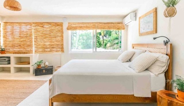 Explorer · Explorer Triple room with garden and lagoon view