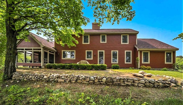 Exquisite Cape Cod home with large yard, fireplace, central AC, & W/D