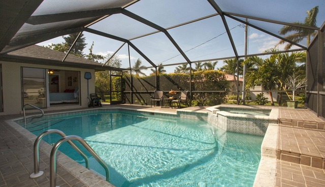 Fantastic Cape Coral 3 Bedroom, 2 Bath West Facing Pool Home near Cape Harbor