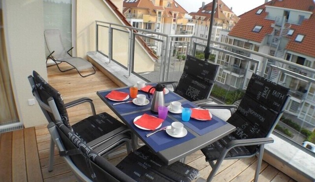 Fantastic penthouse apartment Ostseebrise 13 in Großenbrode. Exclusive feel-good atmosphere with sauna, bathtub & fireplace. Two balconies with loungers and practical washing machine. Incidental costs included
