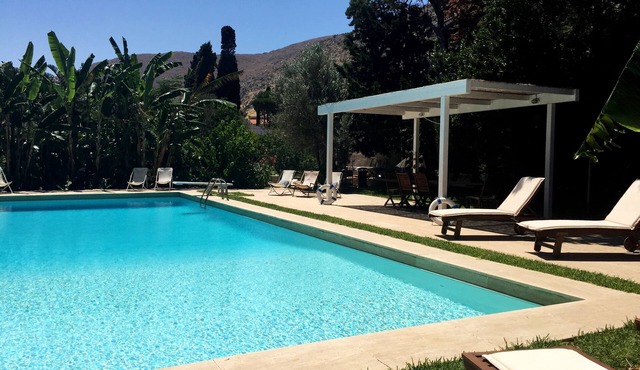 Fantastic pool surrounded by a 10,000 square meters of private garden