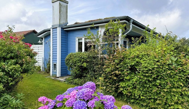 Favorite place by the sea - the Blaue Pause vacation home with fireplace and garden.