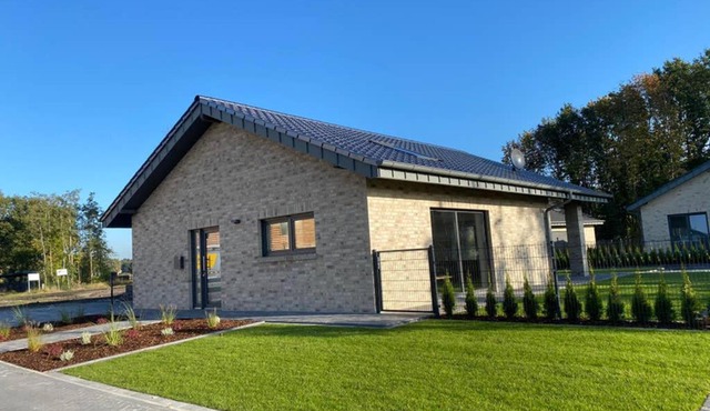 Ferienhaus am Harkebrügger See mit Sauna Haus Louis