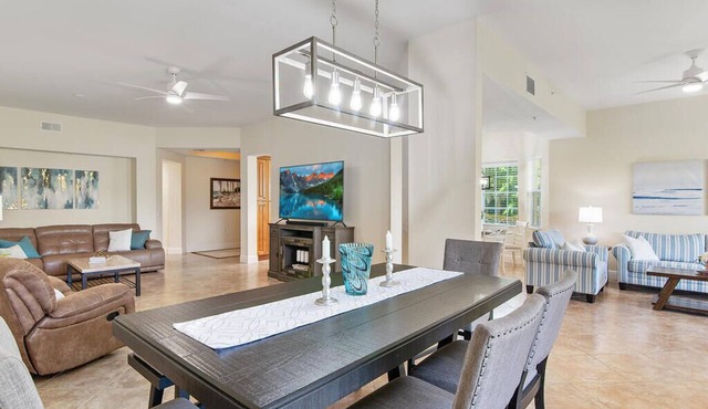 Fiddler's Creek first floor coach home. 3 bed /3 bath. Bright open floor plan.