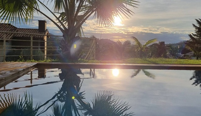 Fireplace, swimming pool, 4 suites, private mini-golf, gated community with 24-hour security.