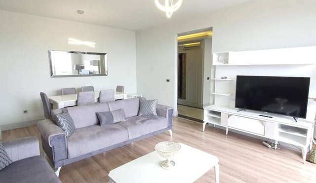 FIRST AVENUE 2 bedrooms, Livingroom with a charming sea view