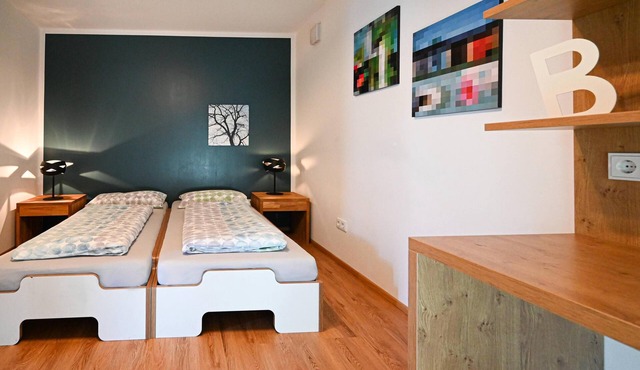 First floor apartment with its own garden corner and covered south-east-facing terrace.
