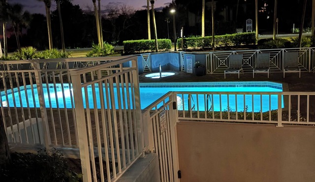 First floor condo overlooking the heated pool. Steps from the private beach!