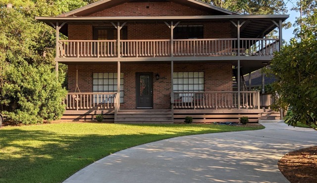 Fishers Foxhole - two story home with wrap around deck and lake access.