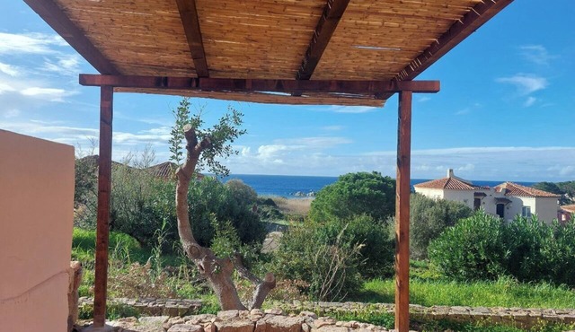 Flat with sea view terrace in holiday village near Isola Rossa