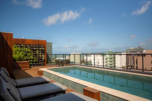 Flat com dois quartos na praia do Cabo Branco - climatizado e completo