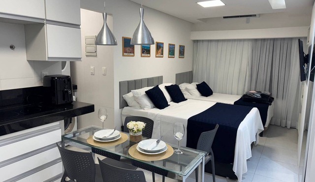 Flat com piscina a 50m da praia