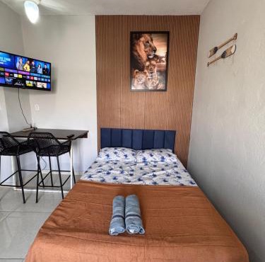 Flat com sacada e churras ,Check-in fácil ,Wi-Fi