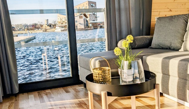 Floating house, view of the water in Västervik, houseboat