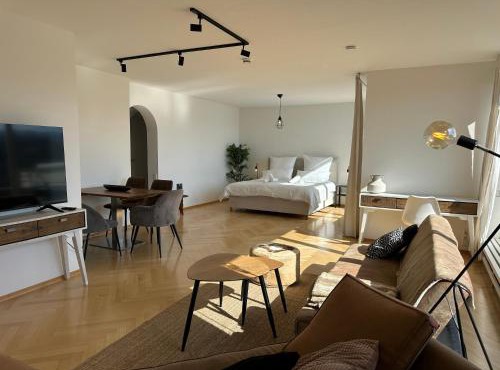 Flow Living I Penthouse mit Dachterrasse I 5 Min zum Ammersee