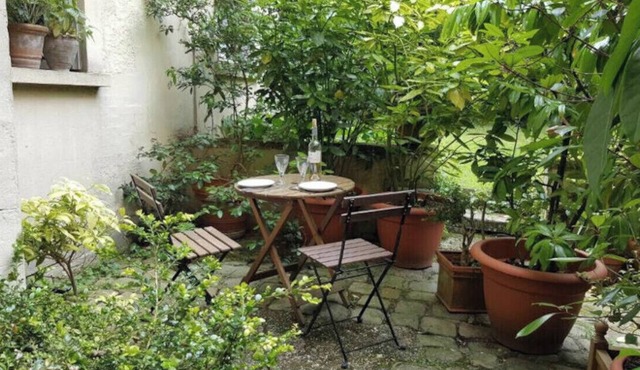 For working or visiting, quiet, first floor with small private courtyard.