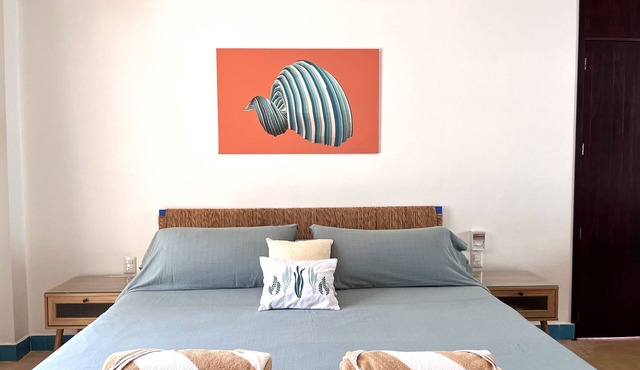 Fully equipped studio with WiFi and AC steps away from the beach