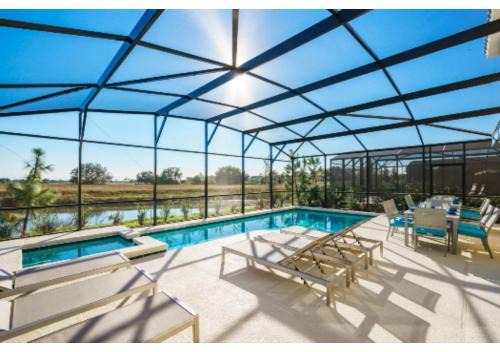 Fully Refurbished Vacation Home with South Facing Pool and Spa with Lake View in Quiet Community Nr Disney