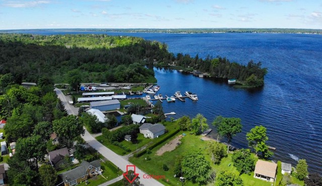 Fun Place with a Sandy Beach for Swimming, Boating & Fishing, Featuring 1 House and 3 Cabins