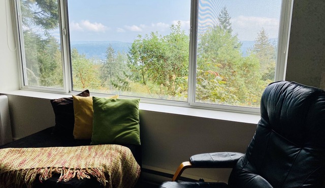 Garden views and ocean glimpses, close to all that Saltspring offers.