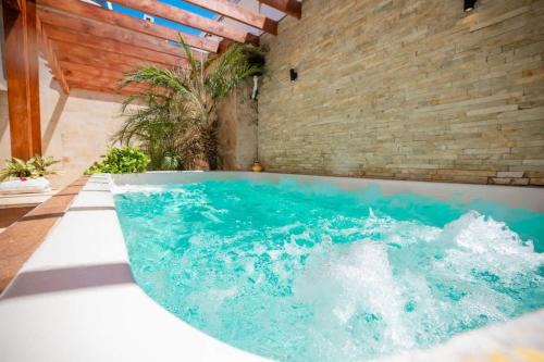 Getaway room with shared Jacuzzi in the center