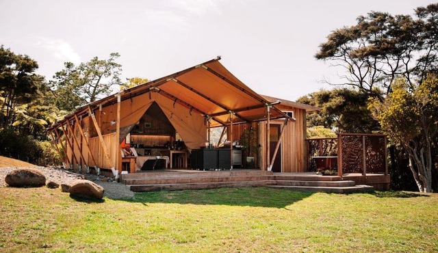 Glamping in Waitakere in this Luxury Safari Tent Rental, for the Best Vacations in New Zealand