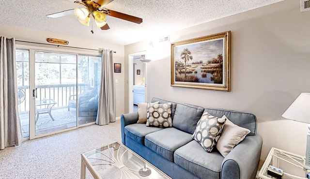 Golf course community condo with fairway views, on-site pool, & balcony