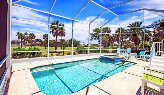 Golf course pool home on 12th hole of the Sanibel Island Golf Club - Isle Awhile