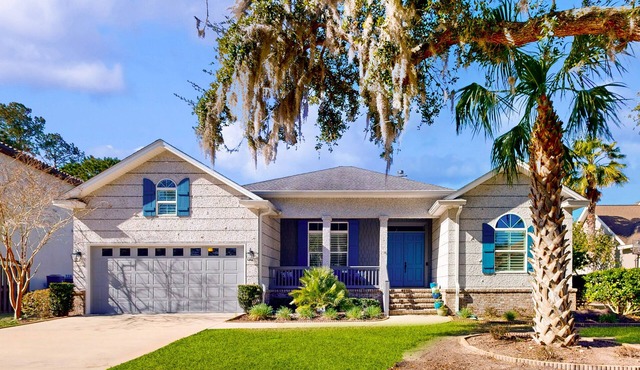 Golf course-view home near beaches with deck, porch, grill, streaming, W/D, & AC