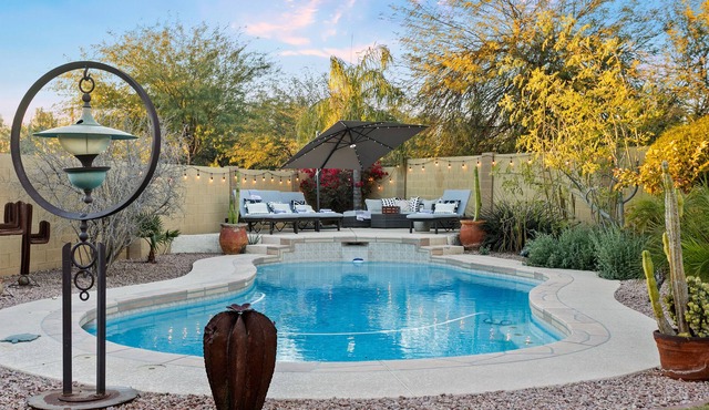 Gorgeous desert escape with a heated pool, fenced yard, washer/dryer, & AC