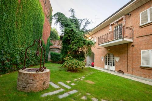 Grande casa con giardino e box auto, 3 camere e 3 bagni