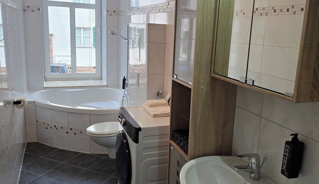 Ground floor apartment + balcony + private parking space