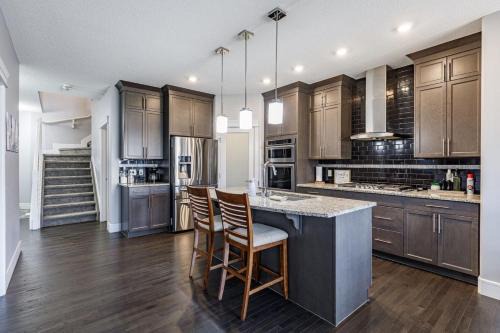 Group Getaway with Yard, Sleeps 13, Near YEG Airpt