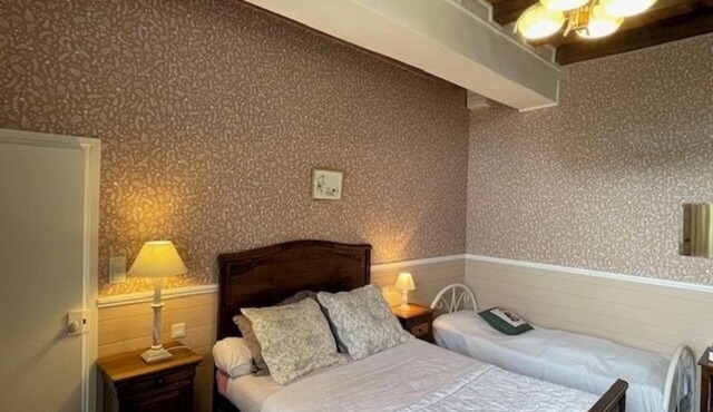 Guest room on the ground floor of the Domaine de Braffais