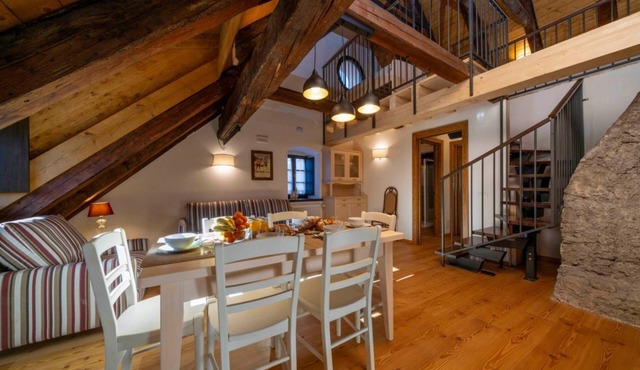 GuestHost - A comfortable 94 square meters apartment, perfect for seven people, located on the second floor of a historic building dating back to 1864 and renovated in 2025 while maintaining its historic atmosphere (NO elevator).The property is located o