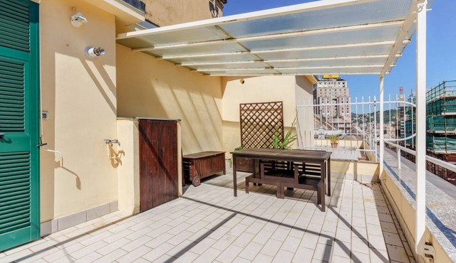 GuestHost - Comfortable 100 sqm apartment, accommodating up to 6 people, located on the sixth floor of a building with an elevator (NOT accessible to disabled guests).The property is located in the residential neighborhood of Carignano, a quiet and well-