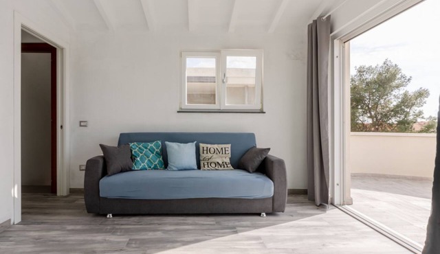 GuestHost - Comfortable Terrace Apartment - Sestu