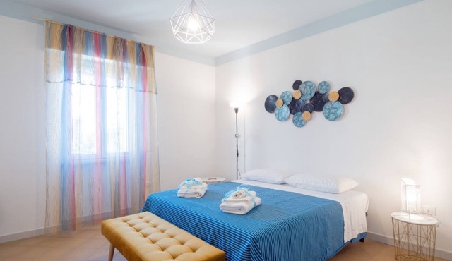 GuestHost - Domus Perrone Garden Blue