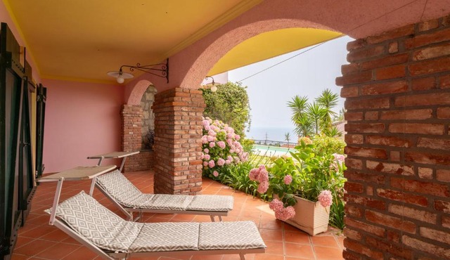 GuestHost - Into the Green! Imperia Appt with Parking & Pool