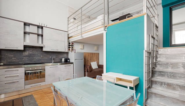 GuestHost - Modern 30 sqm studio apartment, ideal for 2 people, located on the ground floor of a building WITHOUT a lift (one step down to access it).The property is located in the Gorla district, full of all services and well connected thanks to local p