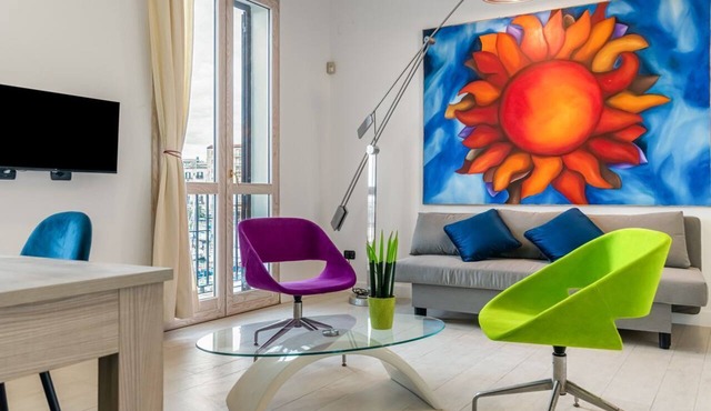 GuestHost - Modern 83 sqm apartment, perfect for 5 people, located on the second floor of an ancient building (NO lift and some steps to access it). The property is located in La Cala, a picturesque port located in the heart of Palermo, just 12 minutes o
