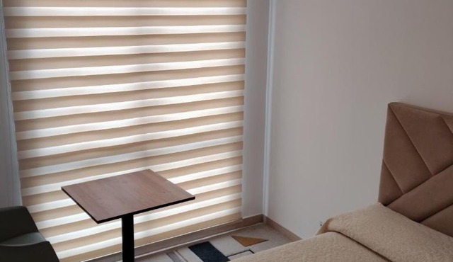 Habitación amoblada en condominio residencial