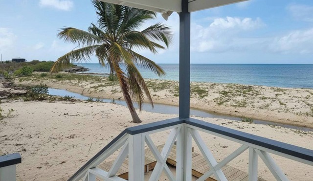 Harrys Cottages Cottage 5 right on the pink sand
