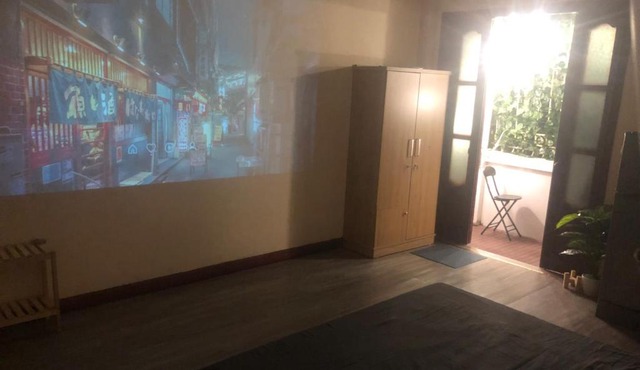 Heart of Old Quarter with projector, near church