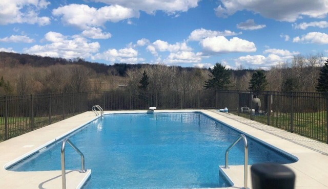 HEATED POOL! 4 Bed/3 Bath home on 30 acres with pond and trails!