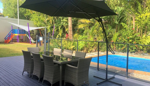 Heated Pool surrounded by Tropical Private Open Space at Trinity