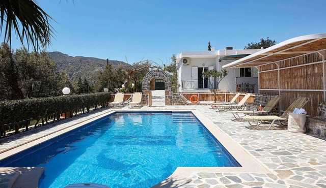 Hillside villa above popular beach resort heaven!
