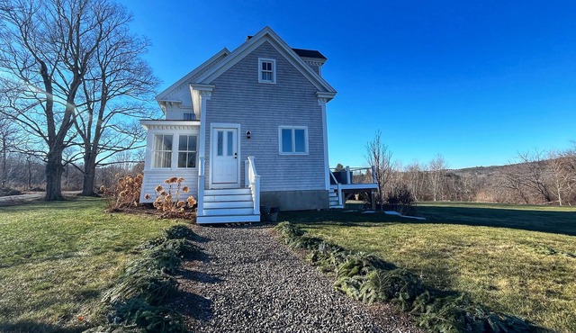 Historic riverfront home with skiing, golf nearby, deck, & washer/dryer