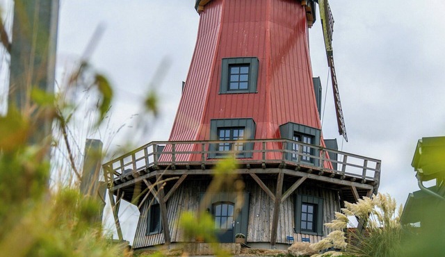 Historic windmill on the Stör River with a view