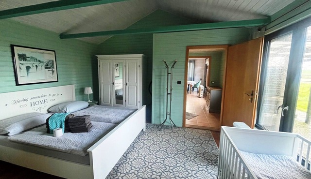 Holiday Apartment 'Holzhaus' with Private Terrace, Garden and Wi-Fi